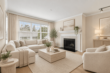 Living room with fireplace and neutral tone furniture